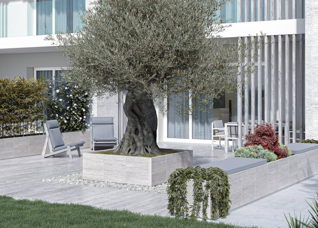fioriera pietra ricostruita giardino.jpg